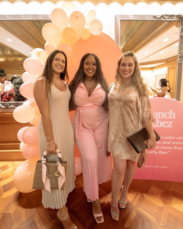 Guests at the Brunch Babez step and repeat